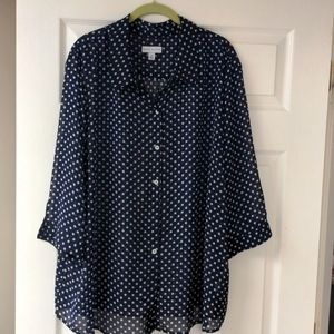 Navy and white polka dot top.